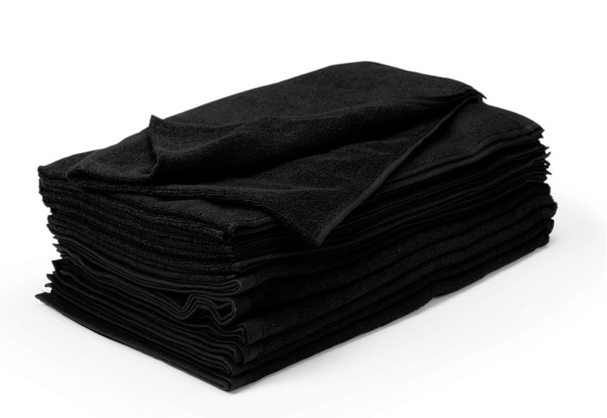 Zwarte kompresdoek van 100% katoen, opgevouwen weergegeven