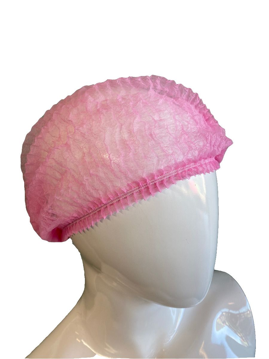 Pak van 100 roze wegwerp haarnetjes met een elastische band, geschikt voor hygiënisch salongebruik