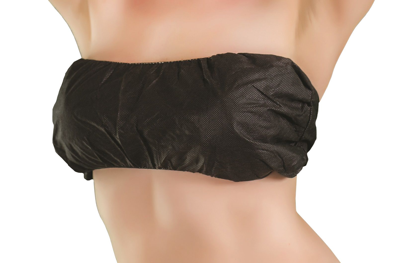 Zwarte wegwerp BH-bandeau voor dames, opgevouwen en liggend, met klittenband sluiting zichtbaar.